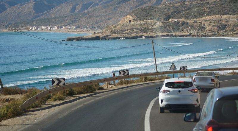 The coast road between Taghazout and Agadir with the Atlantic and surf breaks below