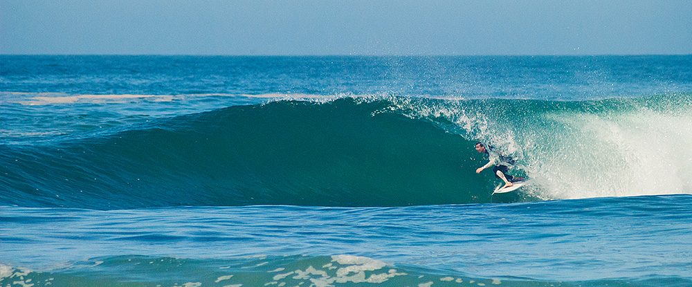 Beach break waves at Anza Beach in Agadir Morocco